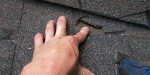 Damaged shingle roofing