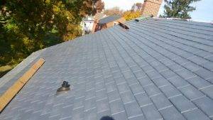 side view of a roof with manufactured slate roofing